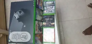 Microsoft Xbox One X 1TB With 8 Latest Game Cd