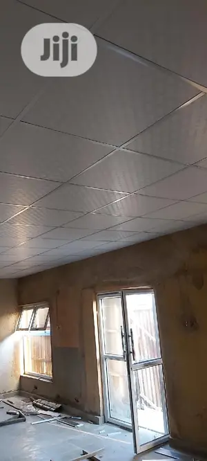 Suspended Ceiling/Wooden Floor.