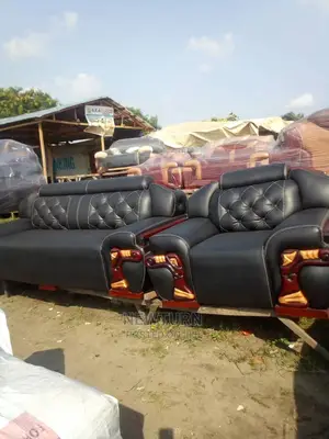 Elegant 7 Seater Black Leather Sofa Chair.