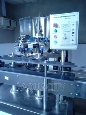 Fully Automated Washing, Filling, and Capping Bottle Line.