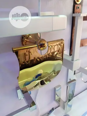 Gold Tusse Holder