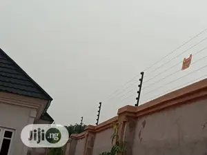 Electric Fence Security on Two and Half Plot of Land