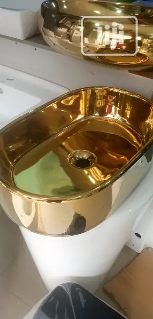 Gold Marble Top Basins.
