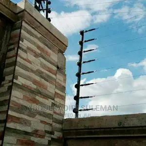 Electric Fence and Barb Wire/Automated Gate