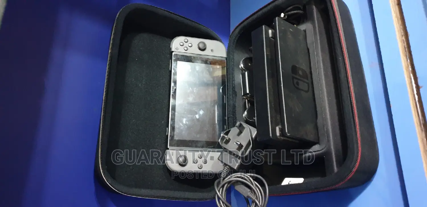Nintendo Switch + 12- 13 Games Inside