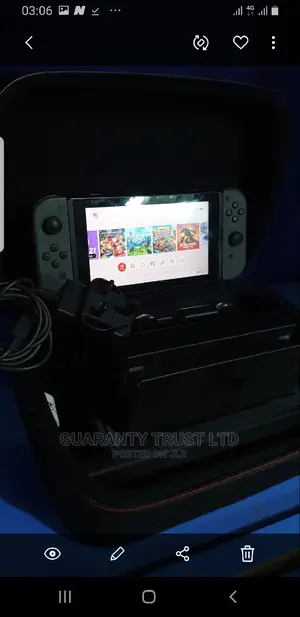 Nintendo Switch + 12- 13 Games Inside