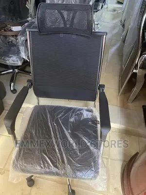 Sleek Swivel Chair With Head Rest