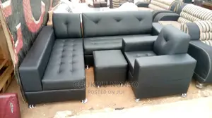 Black L- Shaped Leather Sofa With a Single