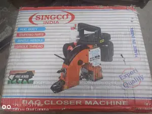 L Bags Closeing Machine ,