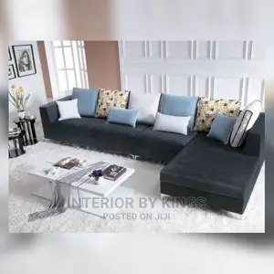 L-Shaped Fabric Sofa With a Coffee Table