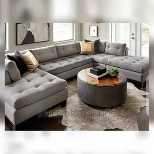 U-Shaped Fabric Sofa With an Ottoman Can Come in Colors