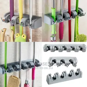 Wall Mounted Mop and Broom Holder.