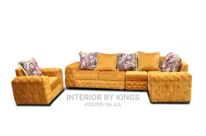 U-Shaped Yellow Sofa With a Single Available for Pick Up