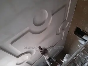 Pop Ceiling, Wall Screeding, Tv Shelf, Artwork And Painting.