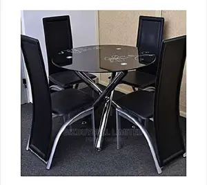 4 Seater Glass Dinning Table.