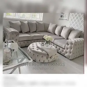 U-Shaped Fabric Sofa With an Ottoman Tufted to Perfection