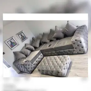 Luxury U-Shaped Fabric Sofa With an Ottoman.