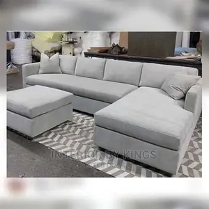L-Shaped Fabric Sofa With an Ottoman Can Come in Colors