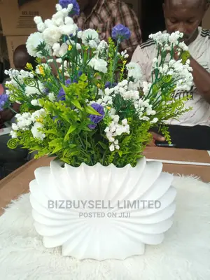 Table Flower With White Ceramic Vase