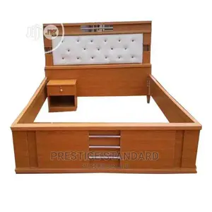 A Simple Padded Bed With a Bedside