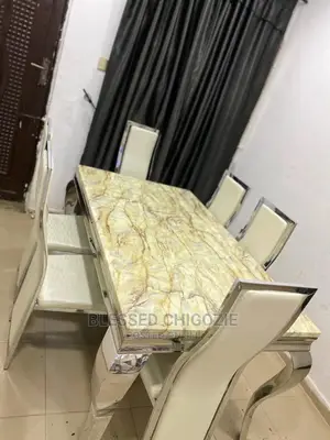Modern 6 Seater Marble Top Dining Table Set.
