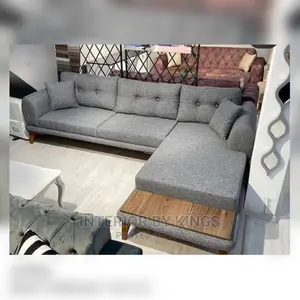 L-Shaped Fabric Sofa Designed With Wooden Remote Holder