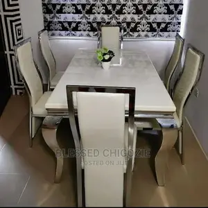 Modern 6 Seater Marble Top Dining Table Set.