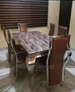 Modern 6 Seater Marble Top Dining Table Set.