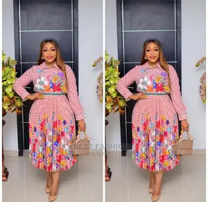 Female Pleated Flower Skirt and Blouse