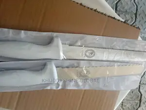 4 1/2" Serrated Edge Utility Knife With White Handle