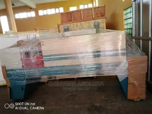 Full Automatic Shrink Wrapping Machine.