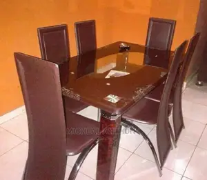 Pedded Glass Dinning Table By 6 Chairs
