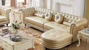 Unique Leather Padded Sofa Chair with Side Tables.