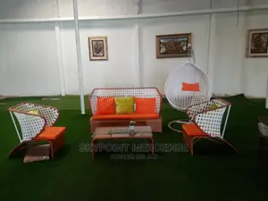 A Set of Ratian Garden Chairs and Table