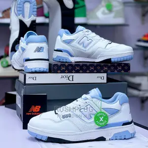 NEW BALANCE 550 UNC ‘ WHITE University / Pale / Carolina