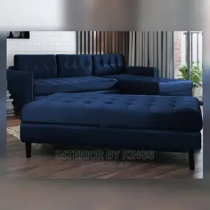 L-Shaped Fabric Sofa With a Center Ottoman
