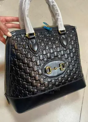 Original Italian Leather Bags by Gucci.