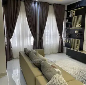 Modern L-Shaped Sofa With Throw Pillows