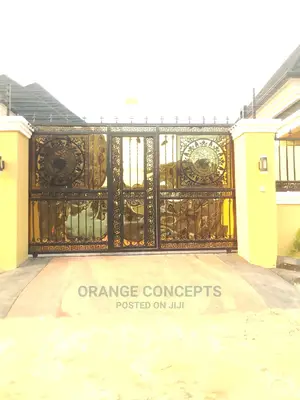 Wrought Iron Gate With Gold Plate