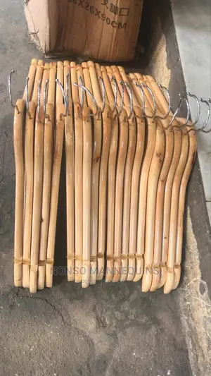 Clean And Neat Set Of Wooden Clothes Hangers