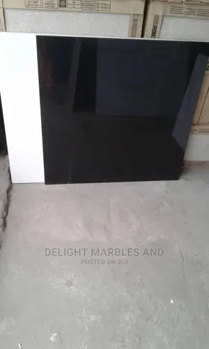 High Grade Glossy 60 by 60 Ceramic Floor Tiles.