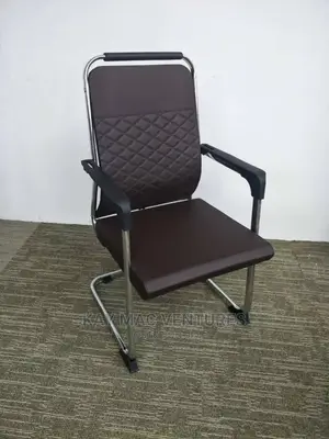 A Stylish Visitors Chair With Leather Patterns