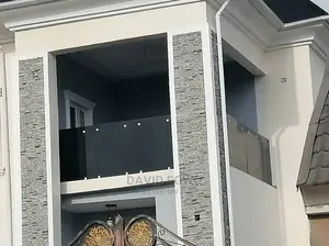 Frameless Balcony With Grey Glass