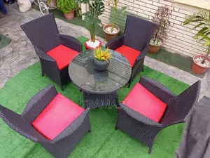 Four Set of Rattan Furniture and Round Table