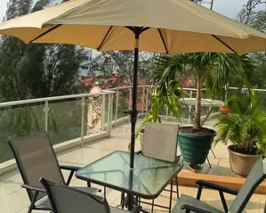 Outdoor Unbrella With 4 Chairs and Table