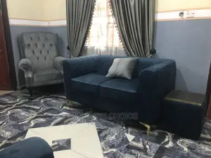5 Seater Strip Sofa and Two Accent Single Seater Up for Grab