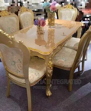 Imported Royal Dinning Table And Chairs Gold