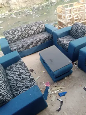 A Standard 7 Seater and a Center Table
