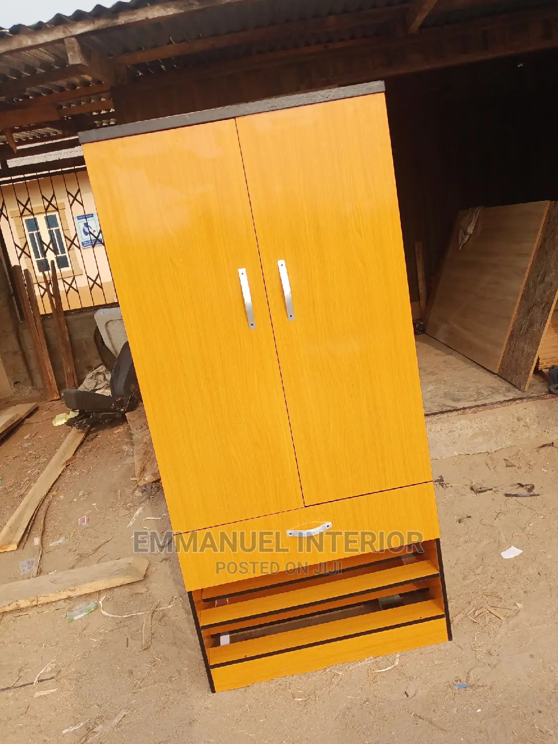 A Mini Wardrobe With Shoe Rack