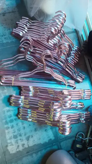 Bundles of Aluminum Made Rose Gold Hangers